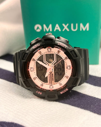 Maxum watch with pink face and black casing on a striped background