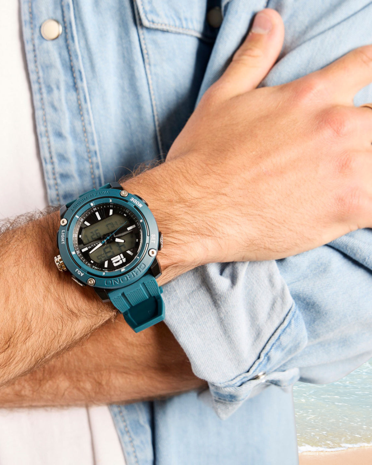Maxum blue Conquest Analogue Digital Watch with a silicone strap and a digital display. On wrist